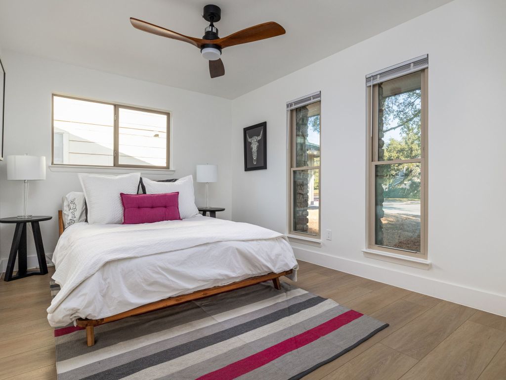 5001 Summerset Trail Austin, TX 78749 - Photo 10 of 11 a bedroom with a bed and a window