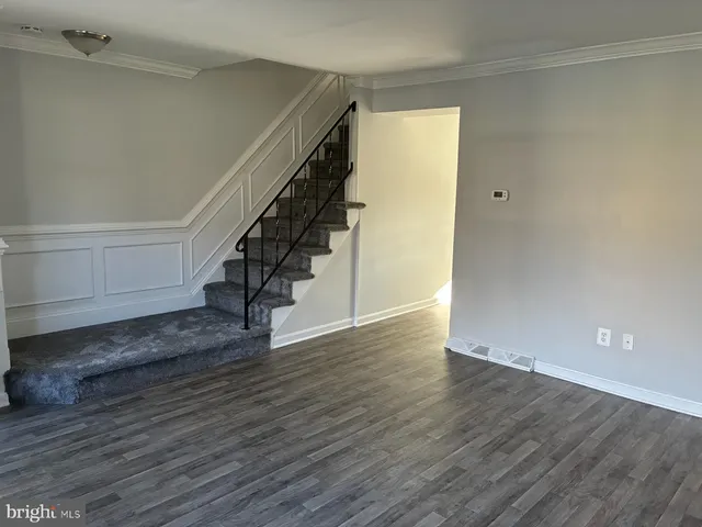 a view of entryway with wooden floor