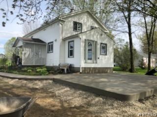 8766 East Eden Road Eden, NY 14057 - Photo 1 of 1 Side/ Rear view of the house with new concrete pat