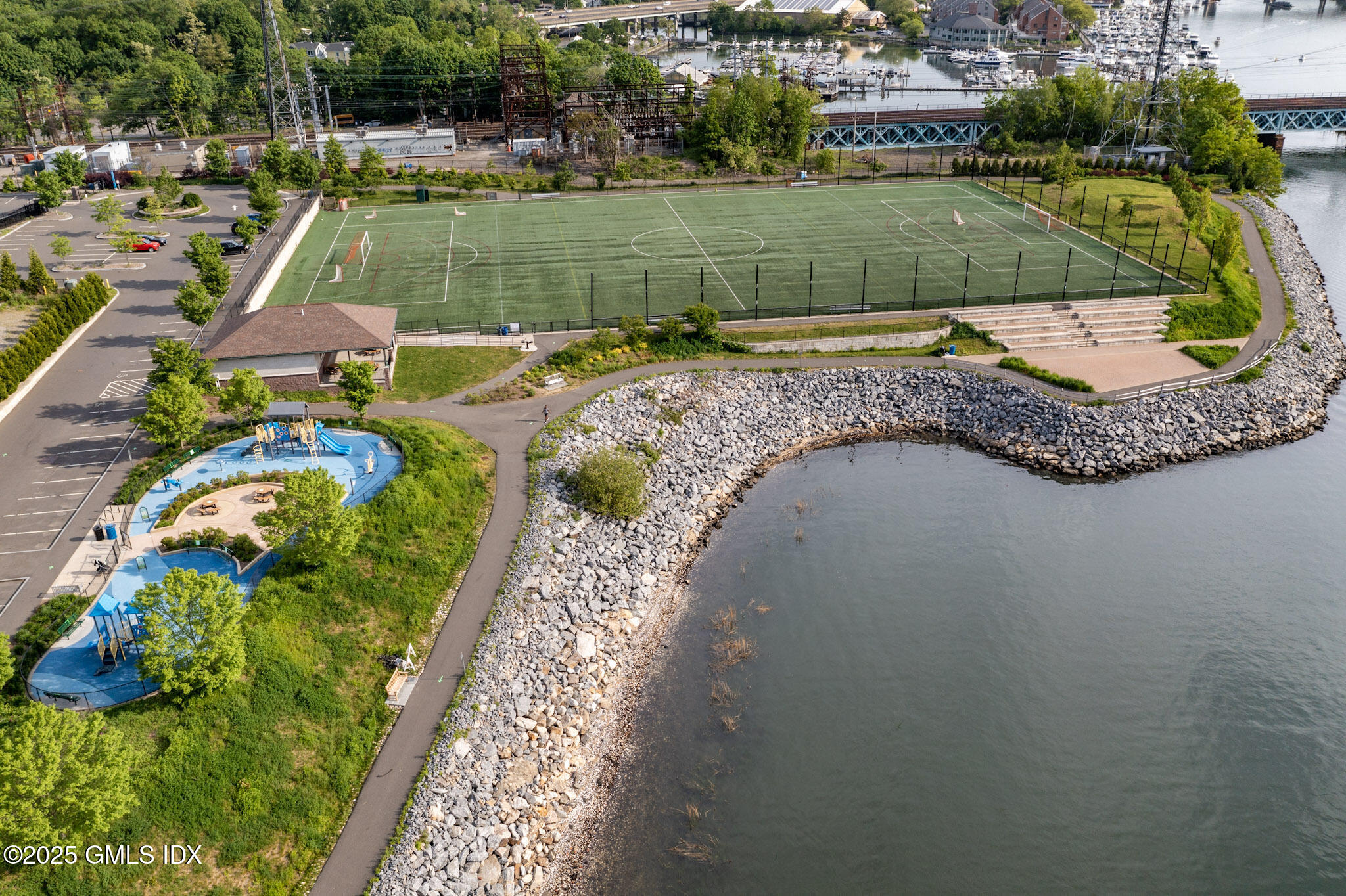 85 Strickland Road, Unit 2 Cos Cob, CT 06807 - Photo 24 of 26 an aerial view of a house with a yard basket ball court and outdoor seating