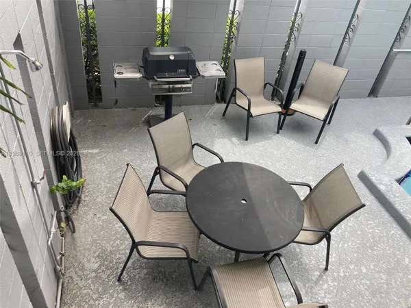 a workspace with furniture and rug