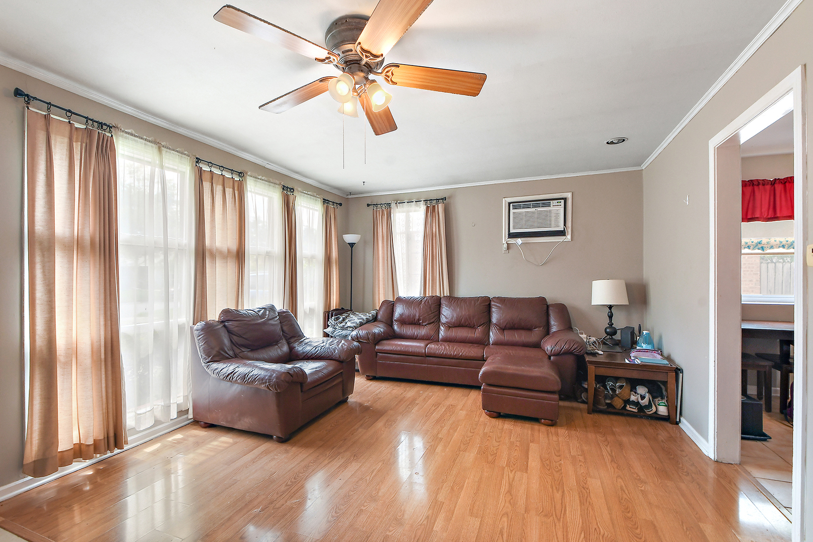 2242 Spruce Road Homewood, IL 60430 - Photo 5 of 15 a living room with furniture and a large window