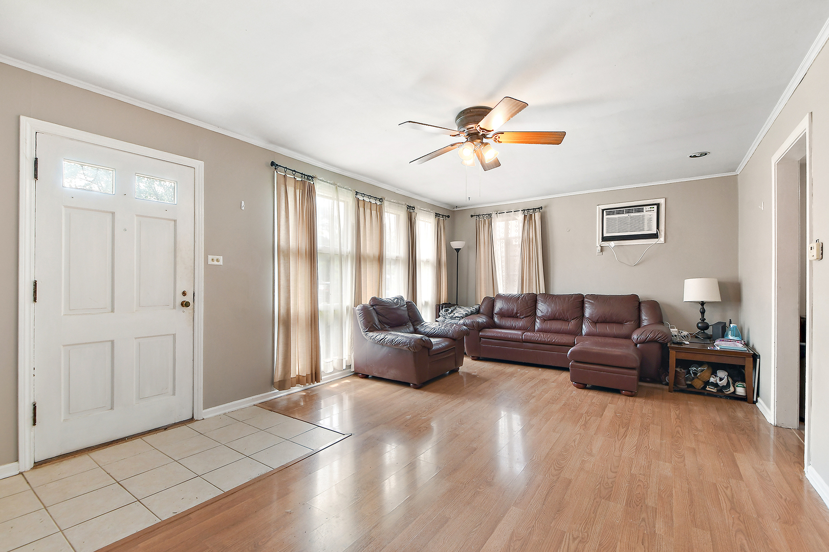 2242 Spruce Road Homewood, IL 60430 - Photo 7 of 15 a living room with furniture and a large window