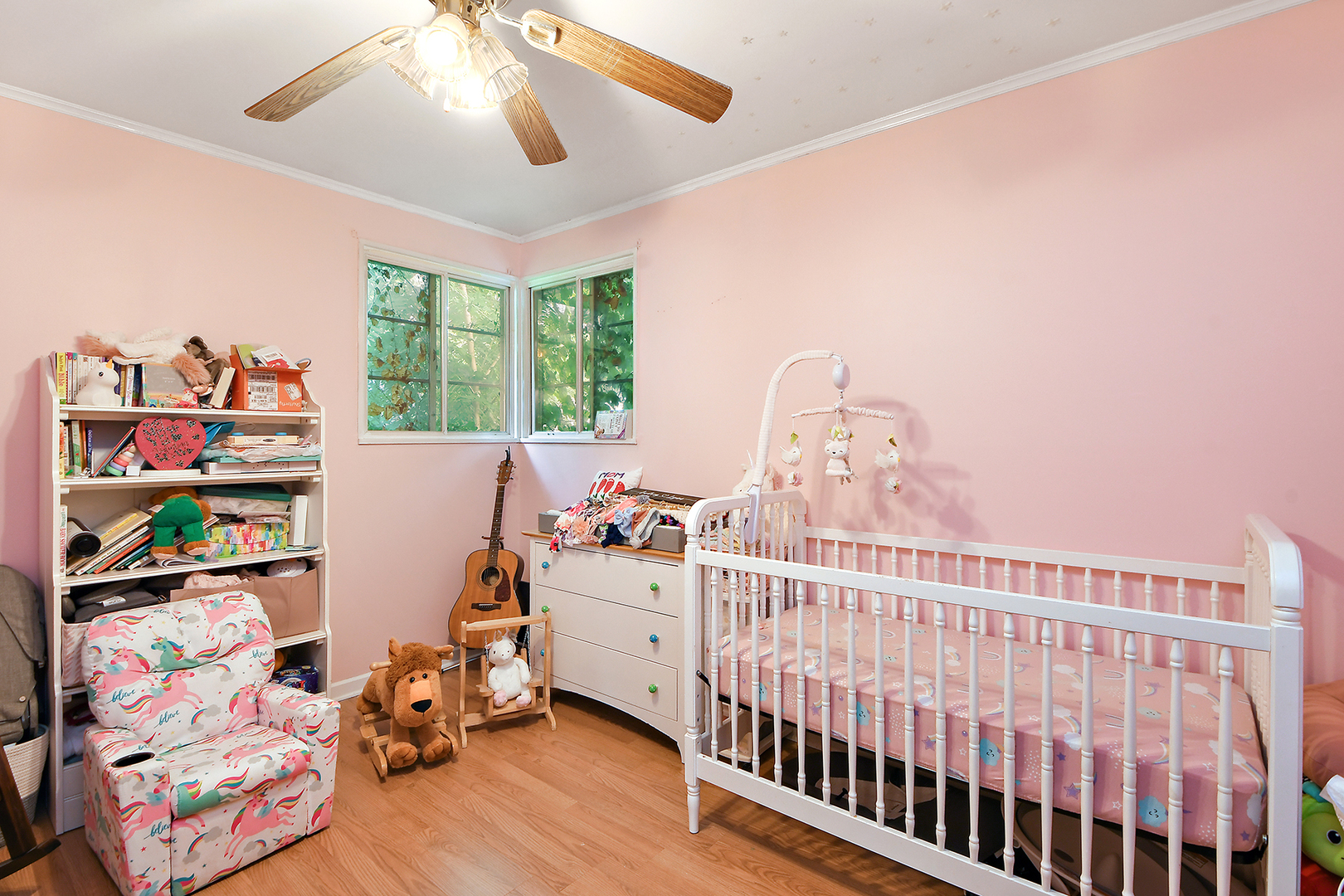 2242 Spruce Road Homewood, IL 60430 - Photo 9 of 15 a view of a bedroom with furniture and toys