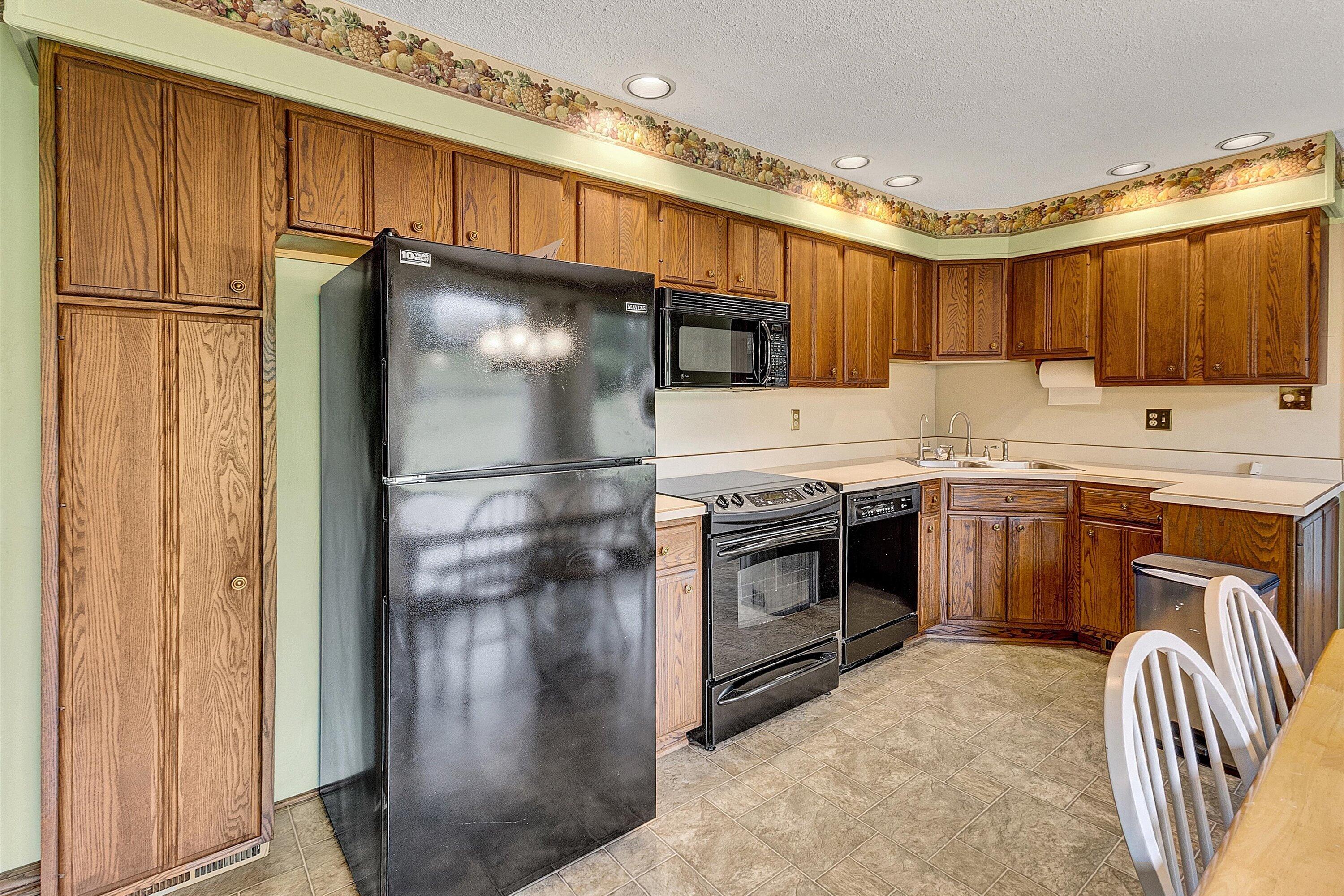 2015 Evergreen Road Covington, VA 24426 - Photo 13 of 46 a kitchen with stainless steel appliances granite countertop a refrigerator a stove a sink and a microwave