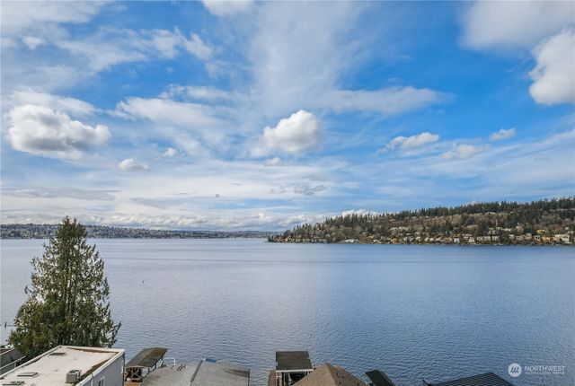 a view of a lake with a city view