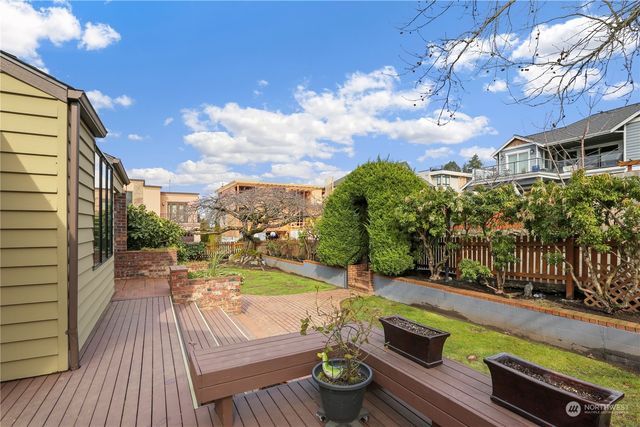 a view of a balcony with furniture