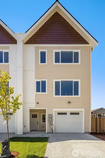 a front view of a house with swimming pool