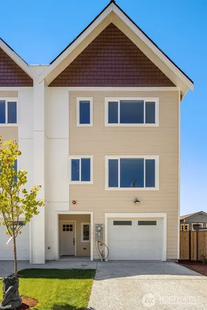 a front view of a house with swimming pool