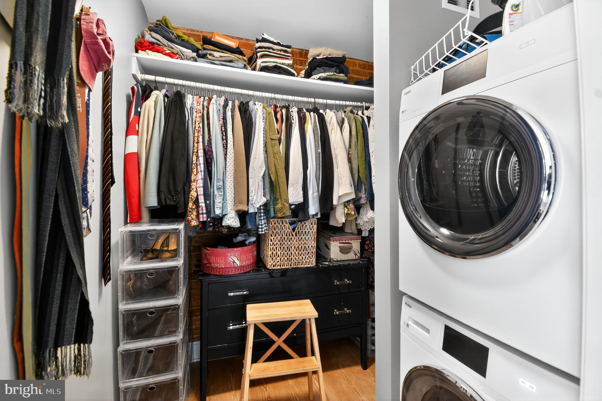 459 Massachusetts Avenue Northwest, Unit 24 Washington, DC 20001 - Photo 16 of 18 a view of walk in closet with clothes and shoes