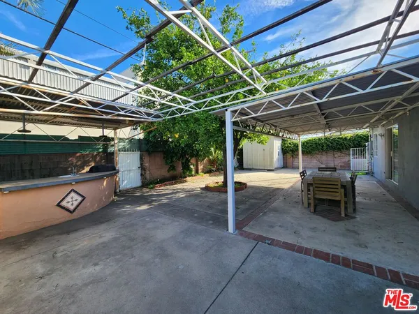 a view of a room with wooden walls