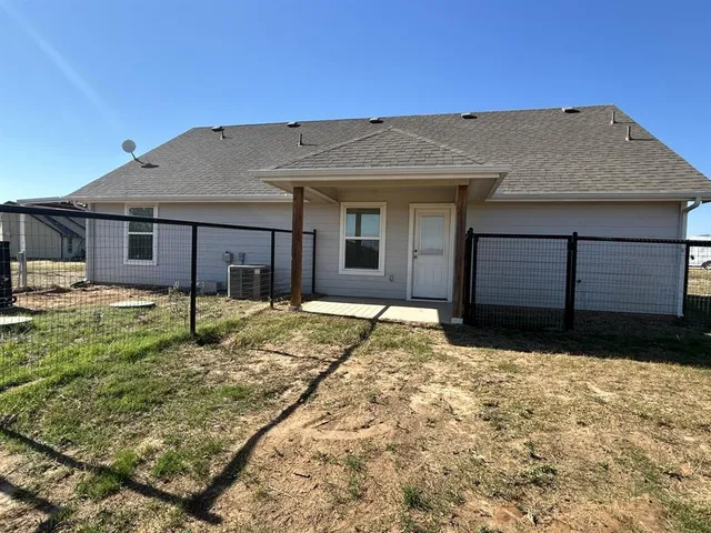 a house view with a outdoor space