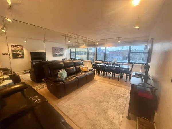 a living room with furniture and a table