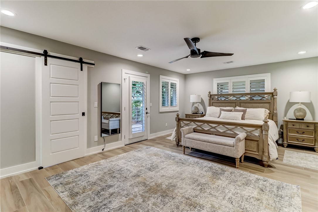 75 Sea Marsh Road Fernandina Beach, FL 32034 - Photo 15 of 30 a bedroom with a bed and a dresser