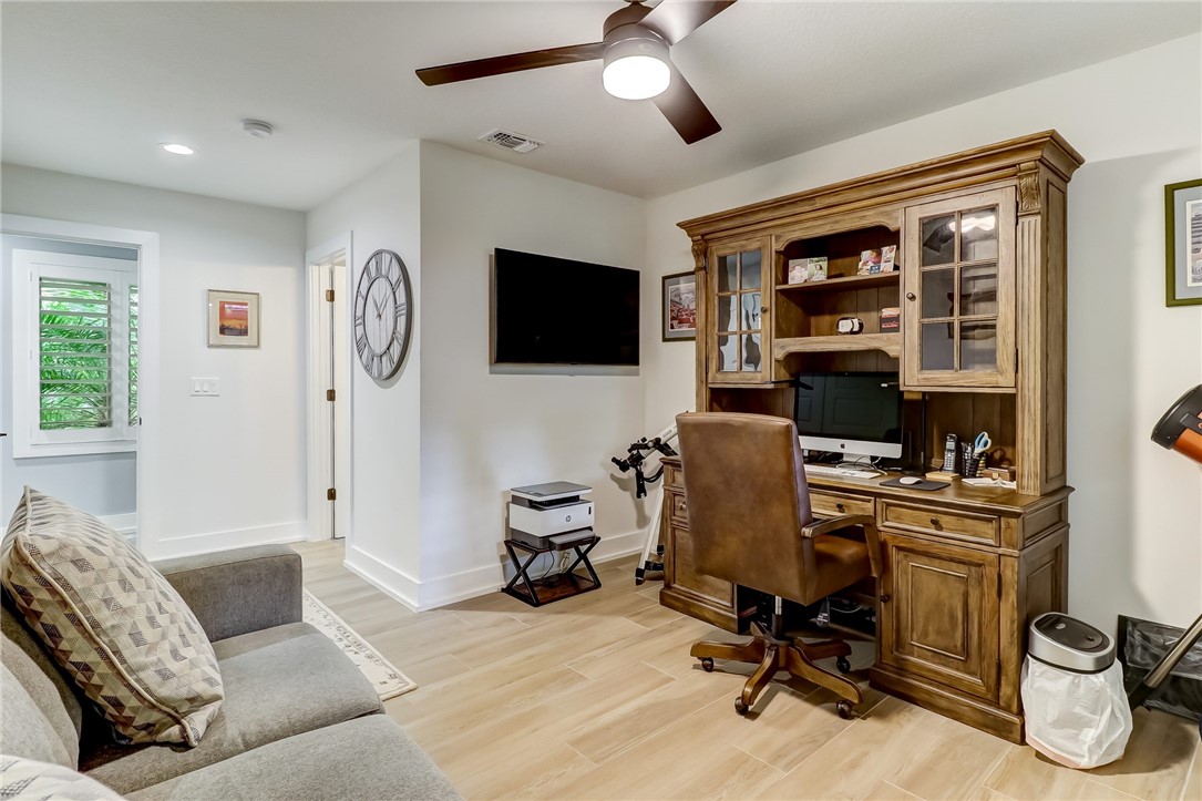 75 Sea Marsh Road Fernandina Beach, FL 32034 - Photo 21 of 30 a view of a livingroom with workspace and a window