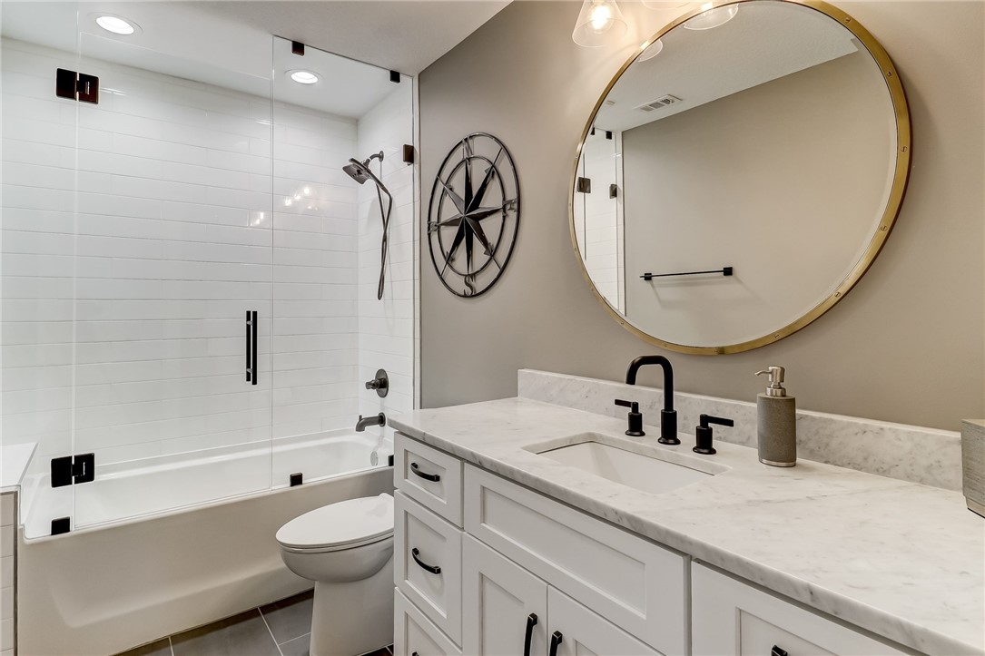 75 Sea Marsh Road Fernandina Beach, FL 32034 - Photo 22 of 30 a bathroom with a sink and a mirror