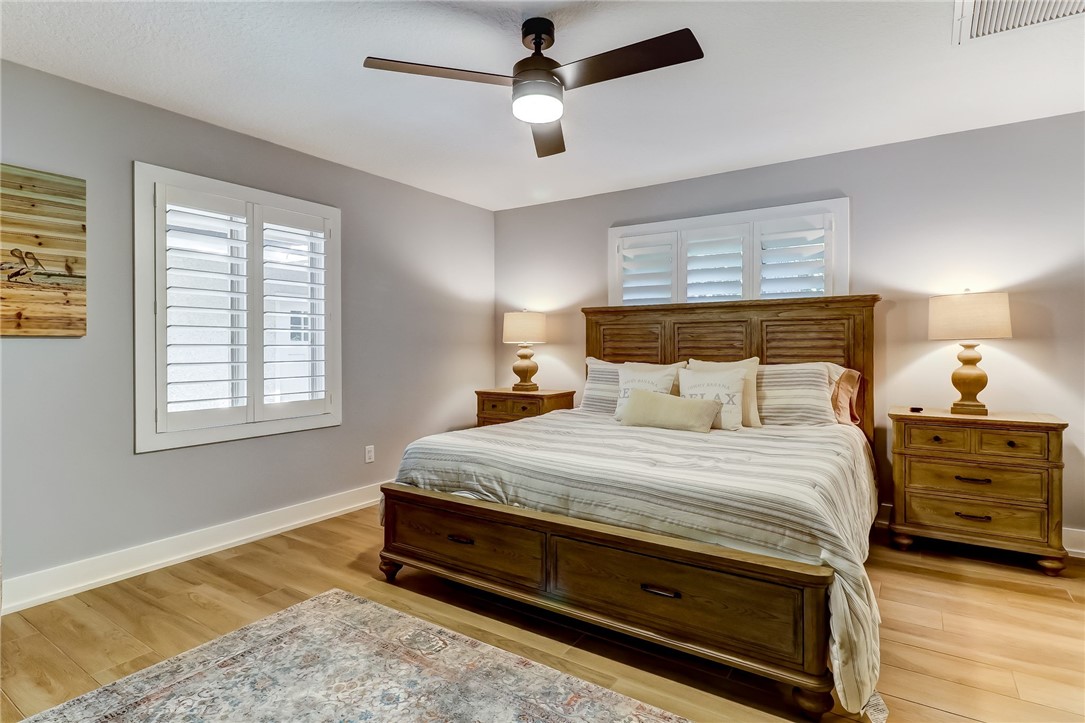 75 Sea Marsh Road Fernandina Beach, FL 32034 - Photo 23 of 30 a bedroom with a bed and a dresser