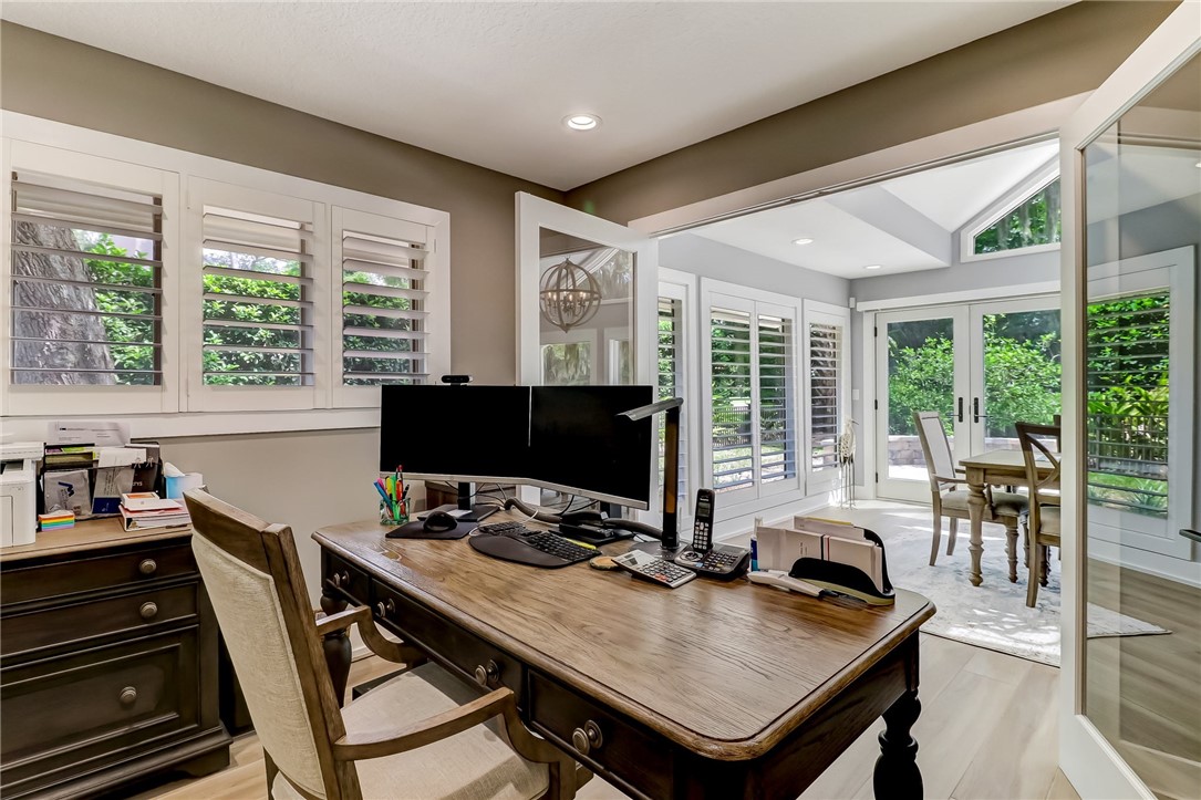75 Sea Marsh Road Fernandina Beach, FL 32034 - Photo 26 of 30 a view of a workspace with furniture and a potted plant