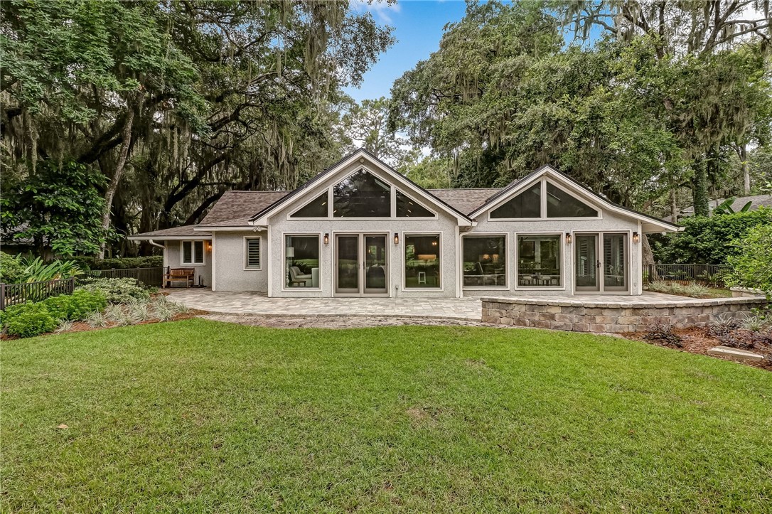 75 Sea Marsh Road Fernandina Beach, FL 32034 - Photo 27 of 30 a front view of a house with a yard