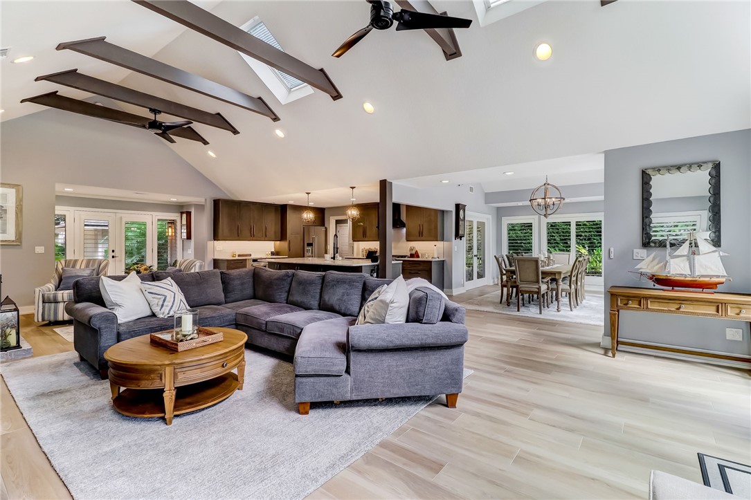 75 Sea Marsh Road Fernandina Beach, FL 32034 - Photo 7 of 30 a living room with furniture and a ceiling fan