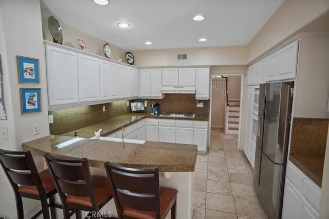 a bathroom with a tub and shower