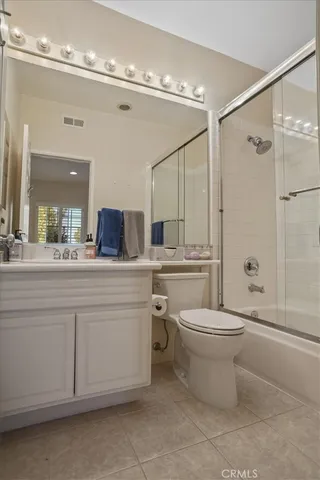 a view of a chairs and table in backyard