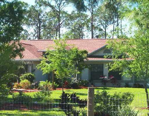 12674 153rd Court North Jupiter, FL 33478 - Photo 1 of 1 FRONT OF HOUSE