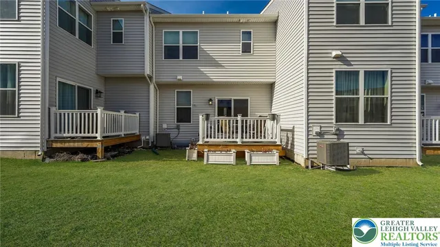 a view of backyard with deck