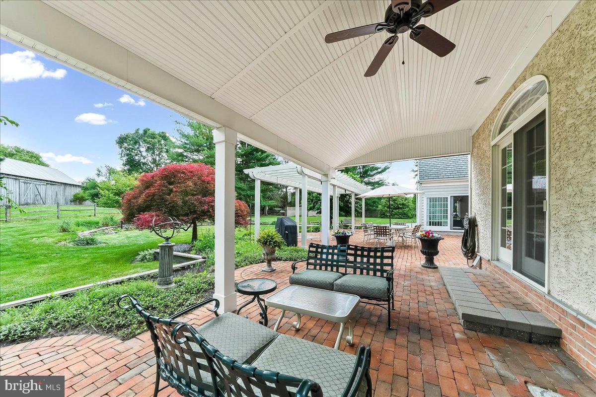 7 Bolingbroke Road West Chester, PA 19382 - Photo 65 of 86 Charming patio with lush greenery.