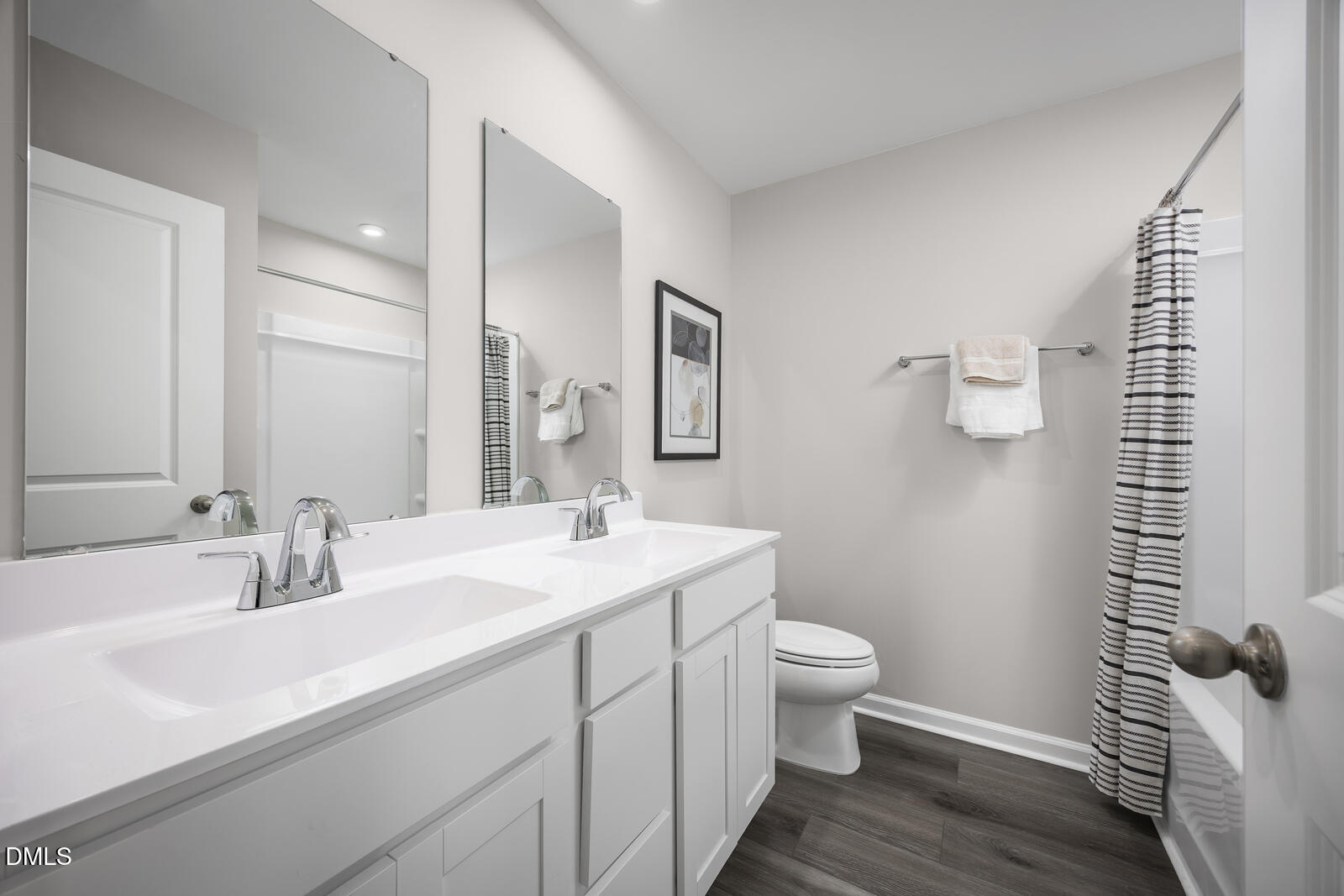 112 Cavalier Rider Run Wendell, NC 27591 - Photo 15 of 21 a bathroom with a sink a toilet a shower and a mirror
