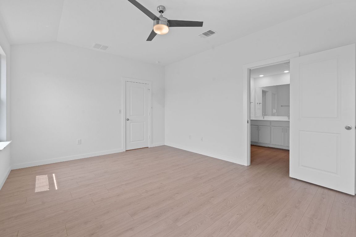 9704 Oxbow Strap Drive Austin, TX 78724 - Photo 13 of 22 a view of an empty room with closet and a window