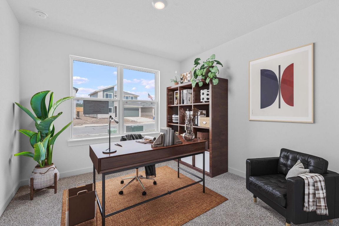 9704 Oxbow Strap Drive Austin, TX 78724 - Photo 17 of 22 a living room with furniture plant and a window