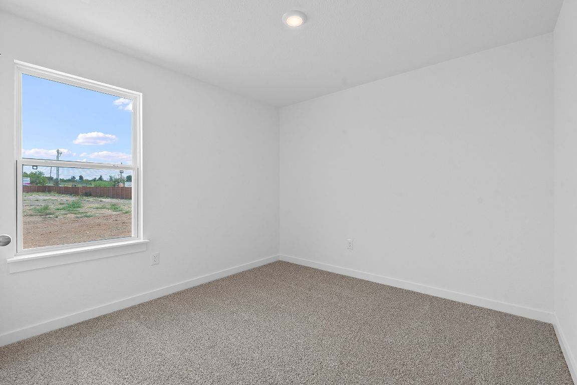 9704 Oxbow Strap Drive Austin, TX 78724 - Photo 19 of 22 an empty room with a window