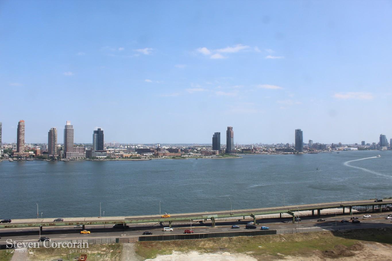 5 Tudor City Place, Unit 1026 Manhattan, NY 10017 - Photo 7 of 8 a view of a water and an ocean