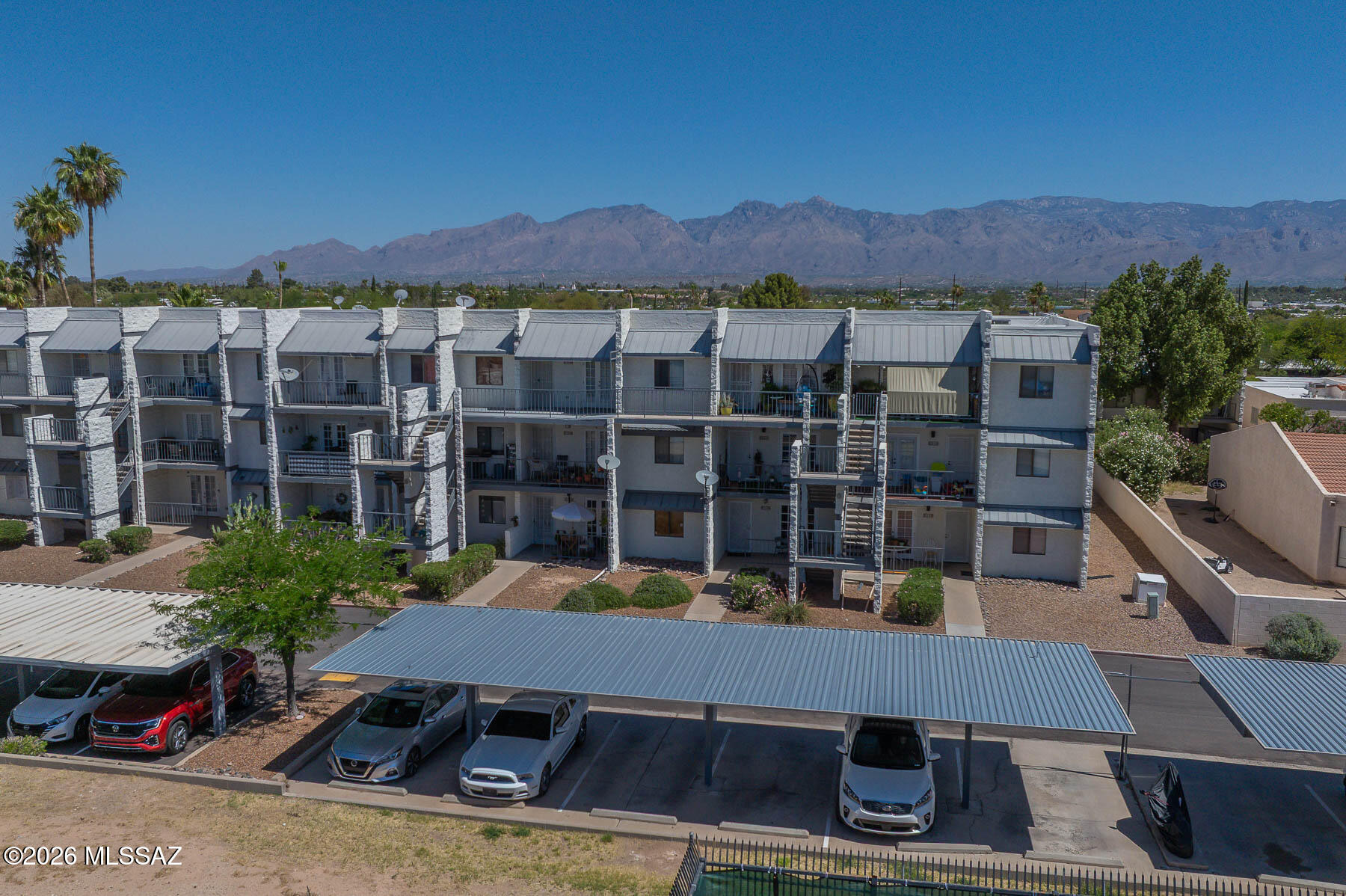 7777 East Golf Links Road, Unit 2308 Tucson, AZ 85730 - Photo 35 of 37 a view of a city with tall buildings