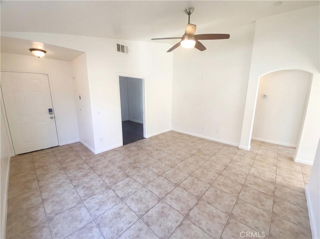 14433 Green River Road Victorville, CA 92394 - Photo 9 of 27 a view of a room with a ceiling fan and shower