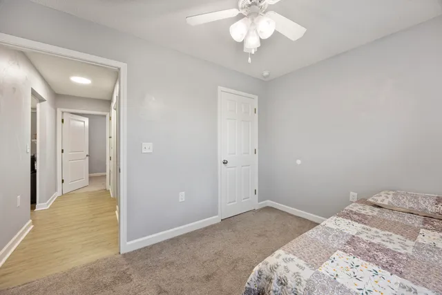 an empty room with a bathroom