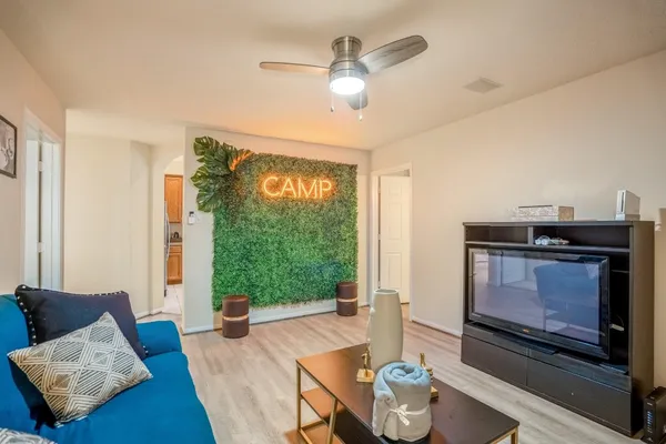 a living room with furniture and a window