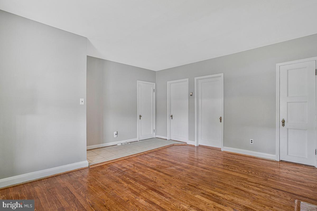3040 Federal Street Baltimore, MD 21213 - Photo 11 of 41 a view of an empty room and wooden floor