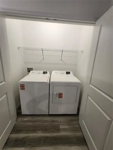 a utility room with dryer and washer