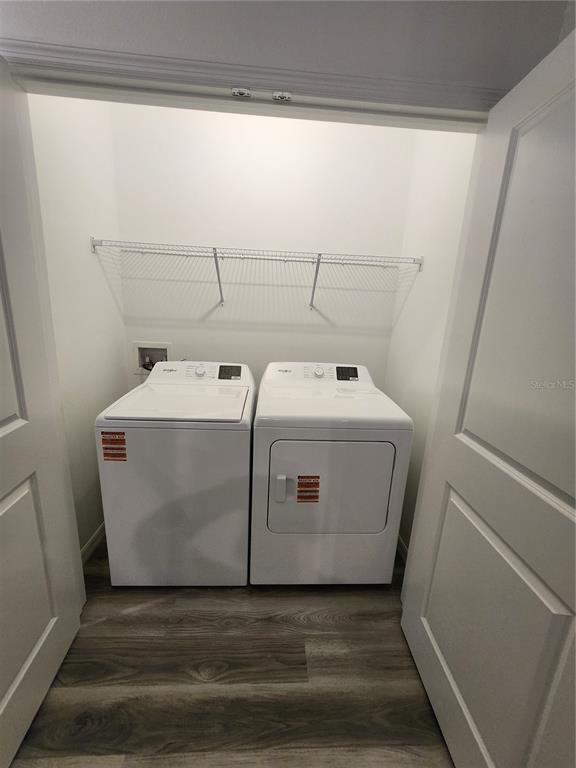 32760 Rustic Rise Road San Antonio, FL 33576 - Photo 26 of 27 a utility room with dryer and washer