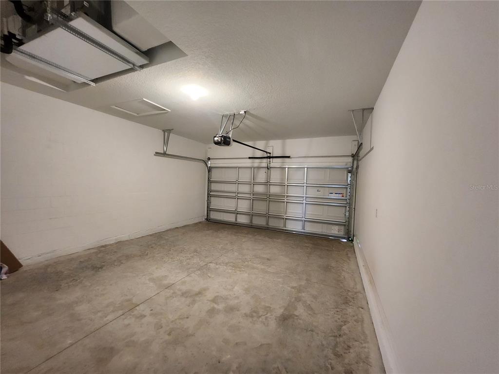 32760 Rustic Rise Road San Antonio, FL 33576 - Photo 27 of 27 a view of a room with storage and racks