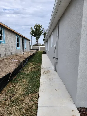 a view of a back yard of the house