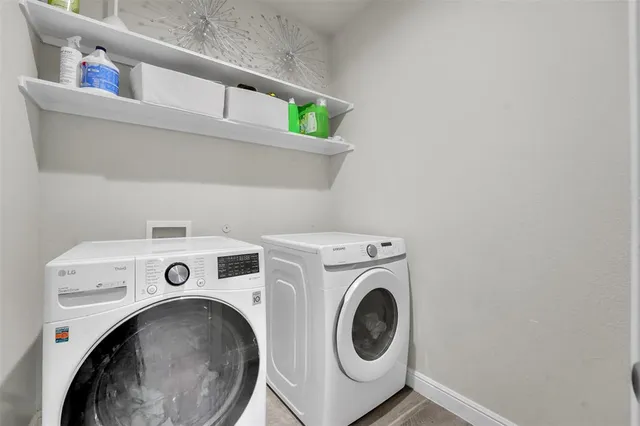 a utility room with dryer and washer