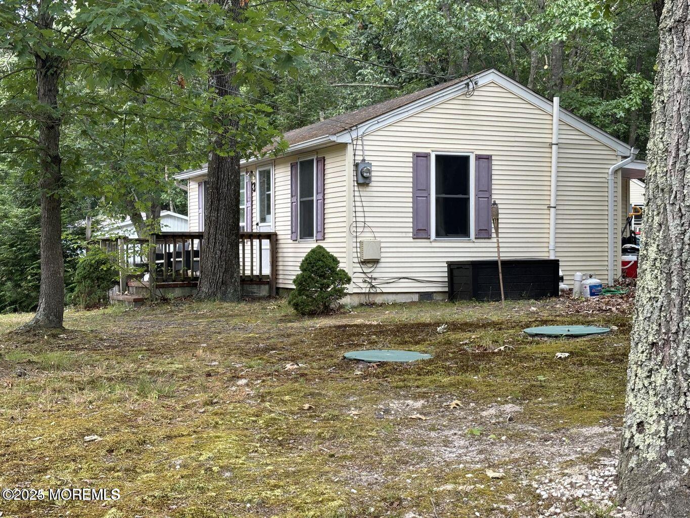 5 Francis Mills Road Freehold, NJ 07728 - Photo 5 of 11 a view of a house with backyard
