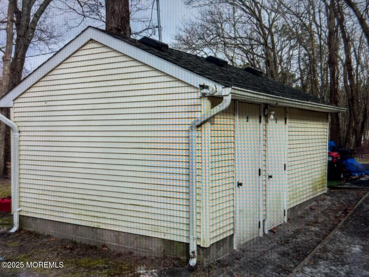 5 Francis Mills Road Freehold, NJ 07728 - Photo 10 of 11 a small white house with a white roof and a yard