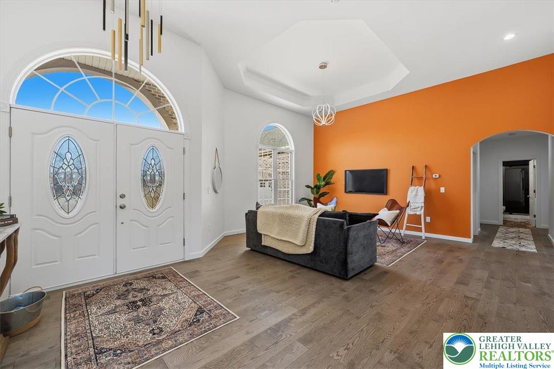 901 Meyer Road Nazareth, PA 18064 - Photo 17 of 80 a living room with furniture and a flat screen tv