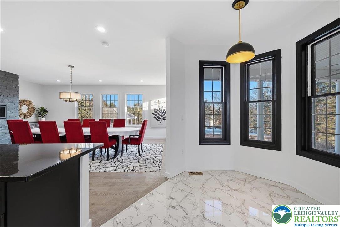 901 Meyer Road Nazareth, PA 18064 - Photo 25 of 80 a view of a dining room with furniture and chandelier