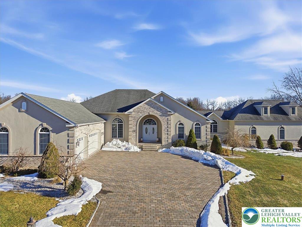 901 Meyer Road Nazareth, PA 18064 - Photo 3 of 80 a front view of a house with a yard