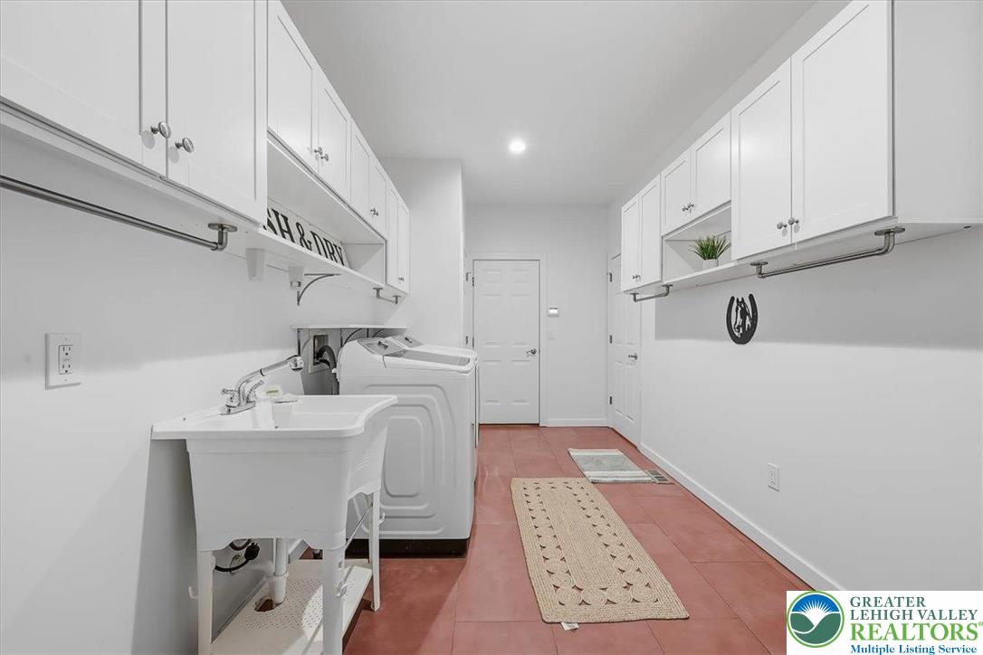 901 Meyer Road Nazareth, PA 18064 - Photo 36 of 80 a bathroom with a sink and a mirror